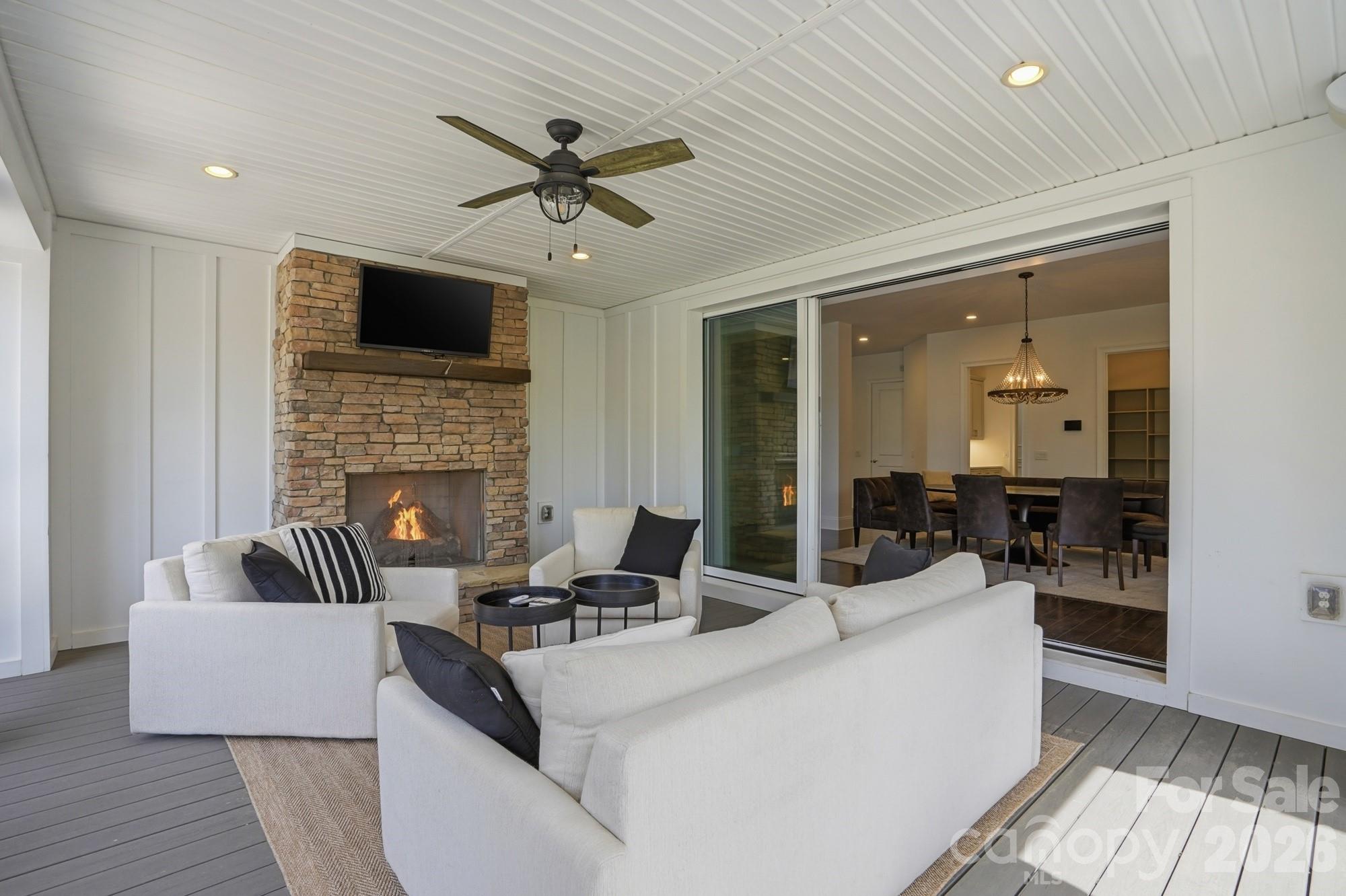 411 Turtleback Ridge Weddington, NC 28104 - Photo 36 of 48 a living room with furniture and a fireplace