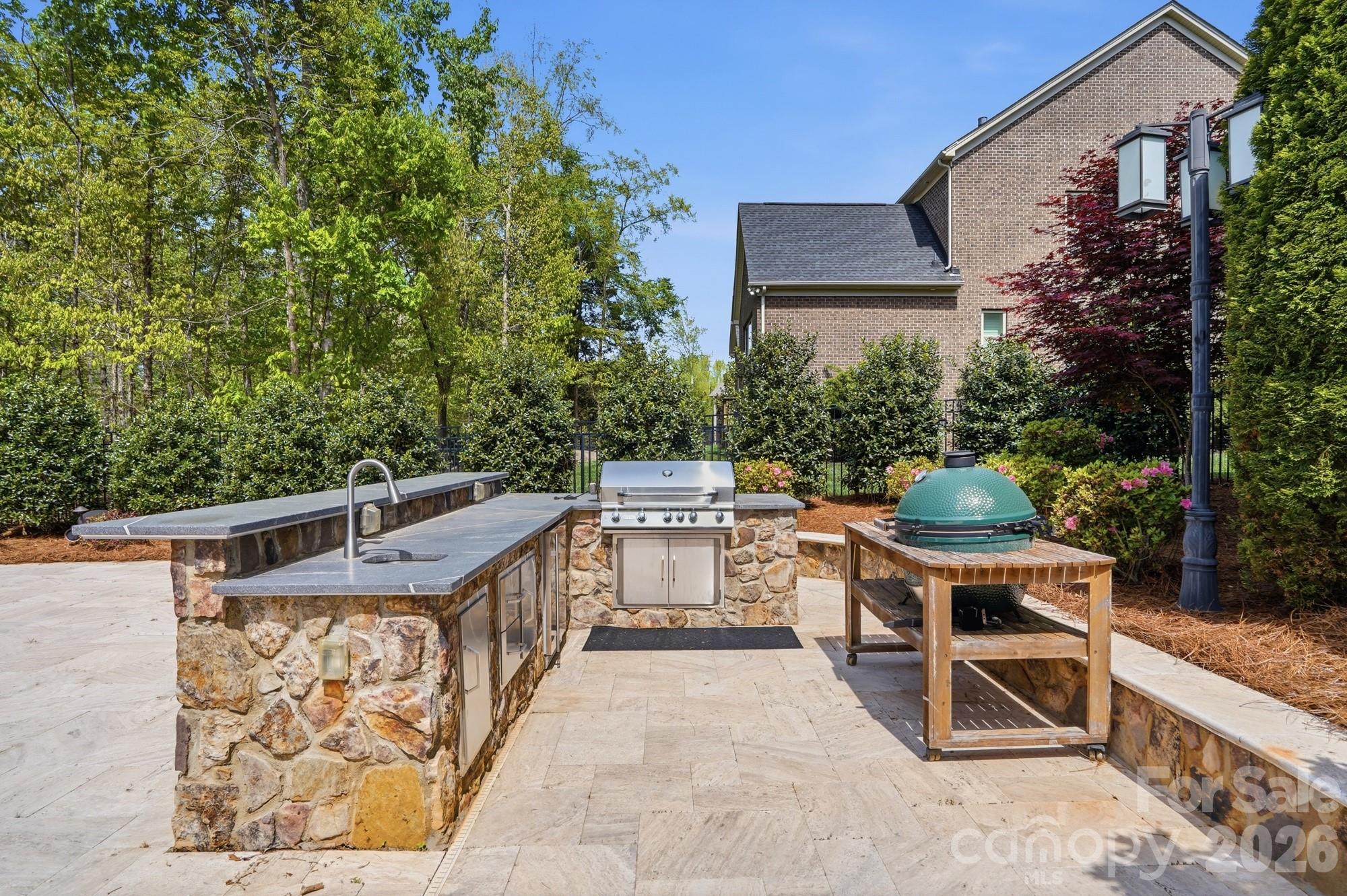 411 Turtleback Ridge Weddington, NC 28104 - Photo 40 of 48 a view of a chairs and table in the terrace