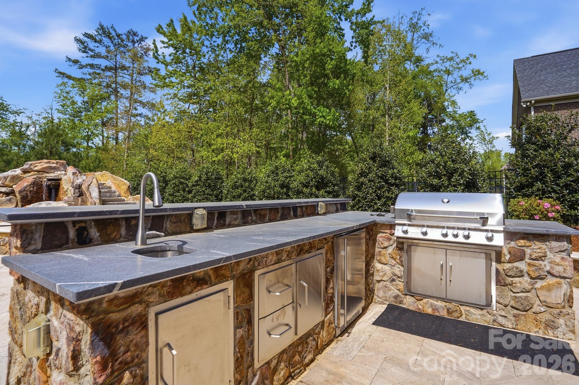 411 Turtleback Ridge Weddington, NC 28104 - Photo 41 of 48 a view of a chairs and table on the terrace