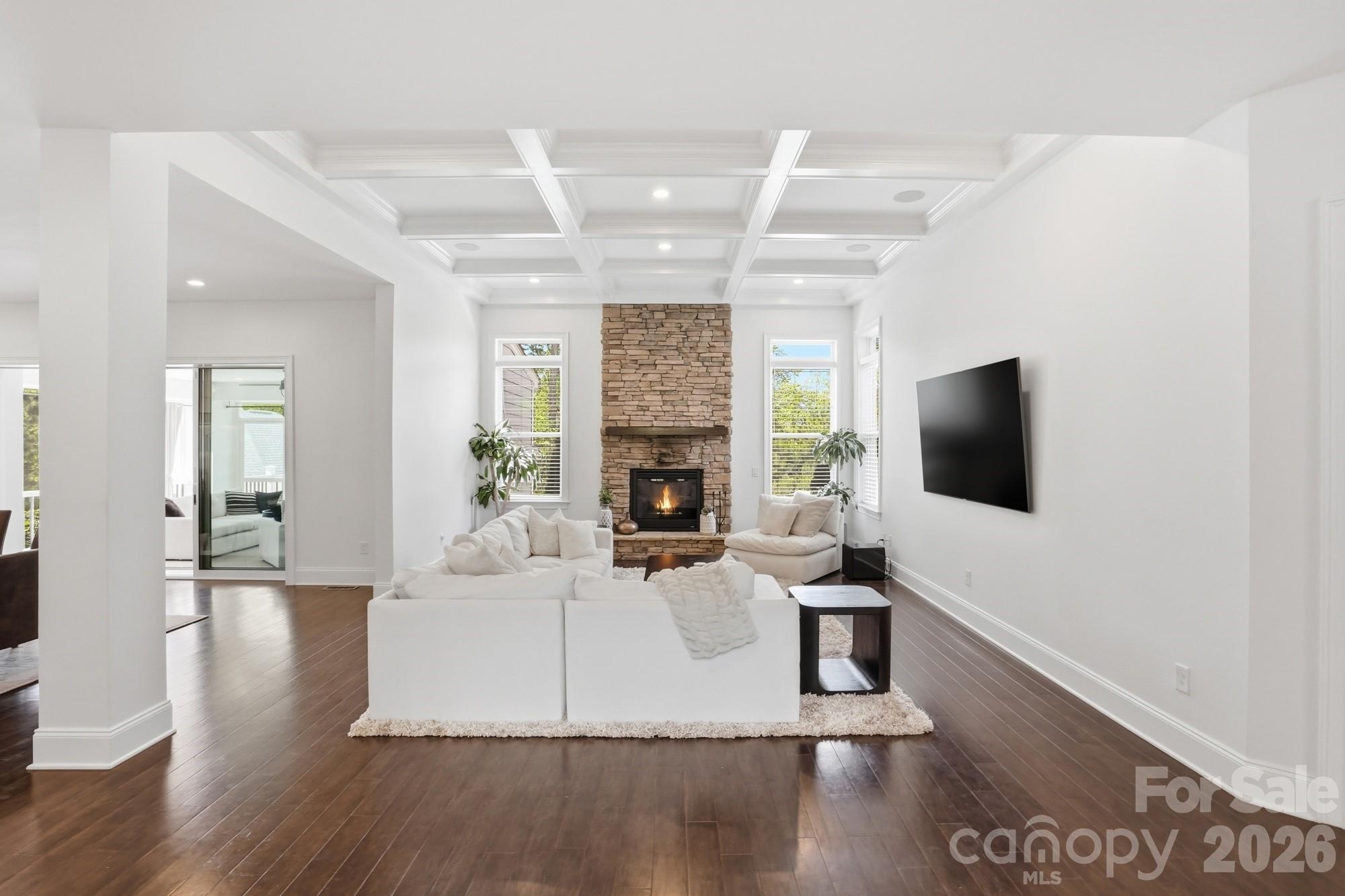 411 Turtleback Ridge Weddington, NC 28104 - Photo 10 of 48 a living room with fireplace furniture and a flat screen tv