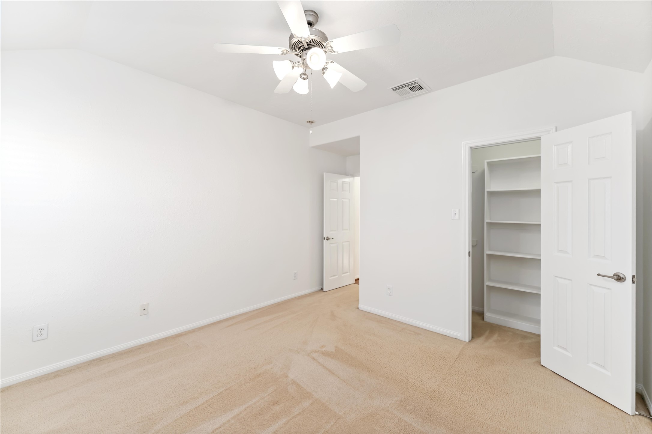 7226 VORGEN Court Spring, TX 77379 - Photo 38 of 45 an empty room with a ceiling fan and a window