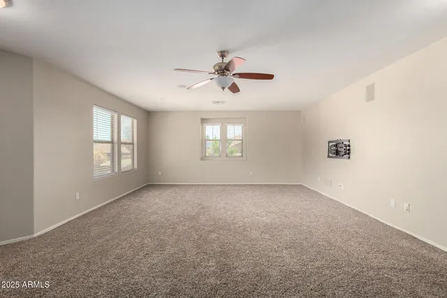 a view of a window in an empty room