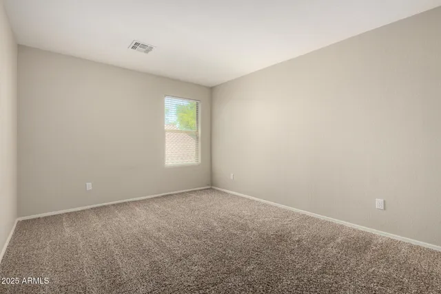 a view of an empty room with window