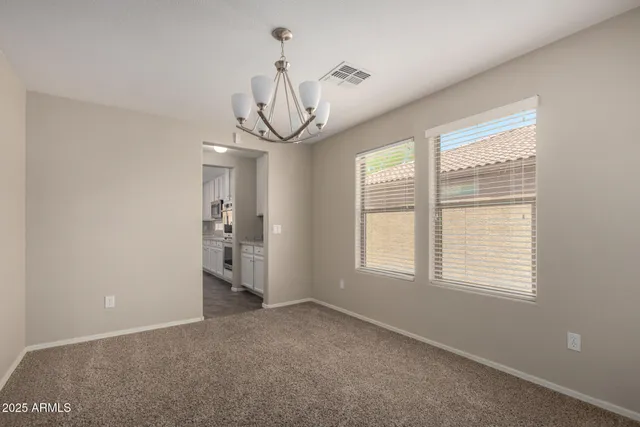 a view of a livingroom with a chandelier
