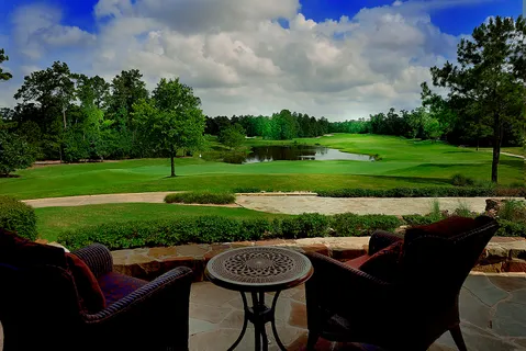 a view of a patio with a yard
