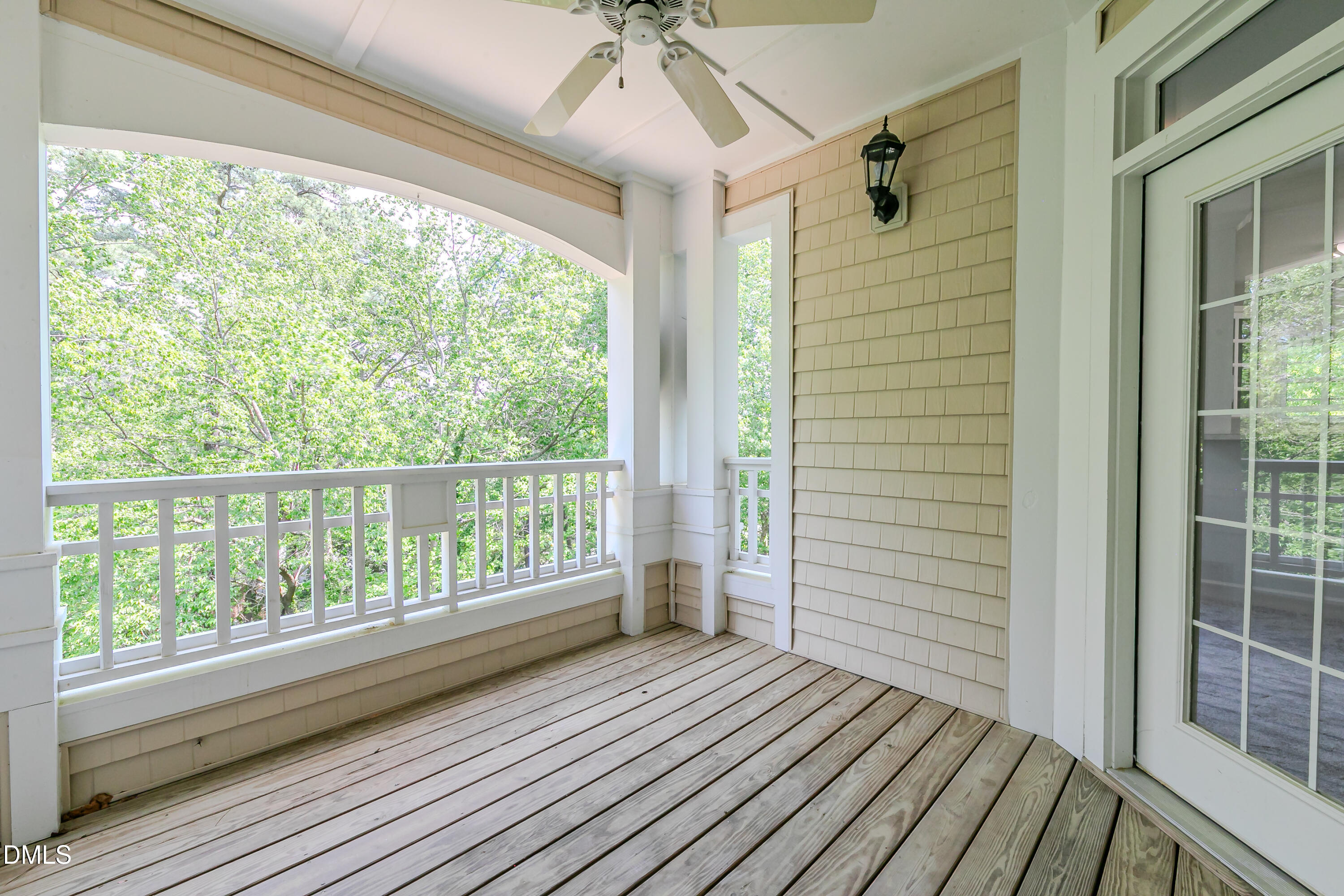 116 Northbrook Drive, Unit 305 Raleigh, NC 27609 - Photo 25 of 43 a view of a room with wooden floor and deck