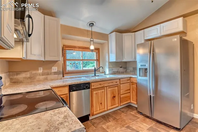 a view of a livingroom with wooden floor