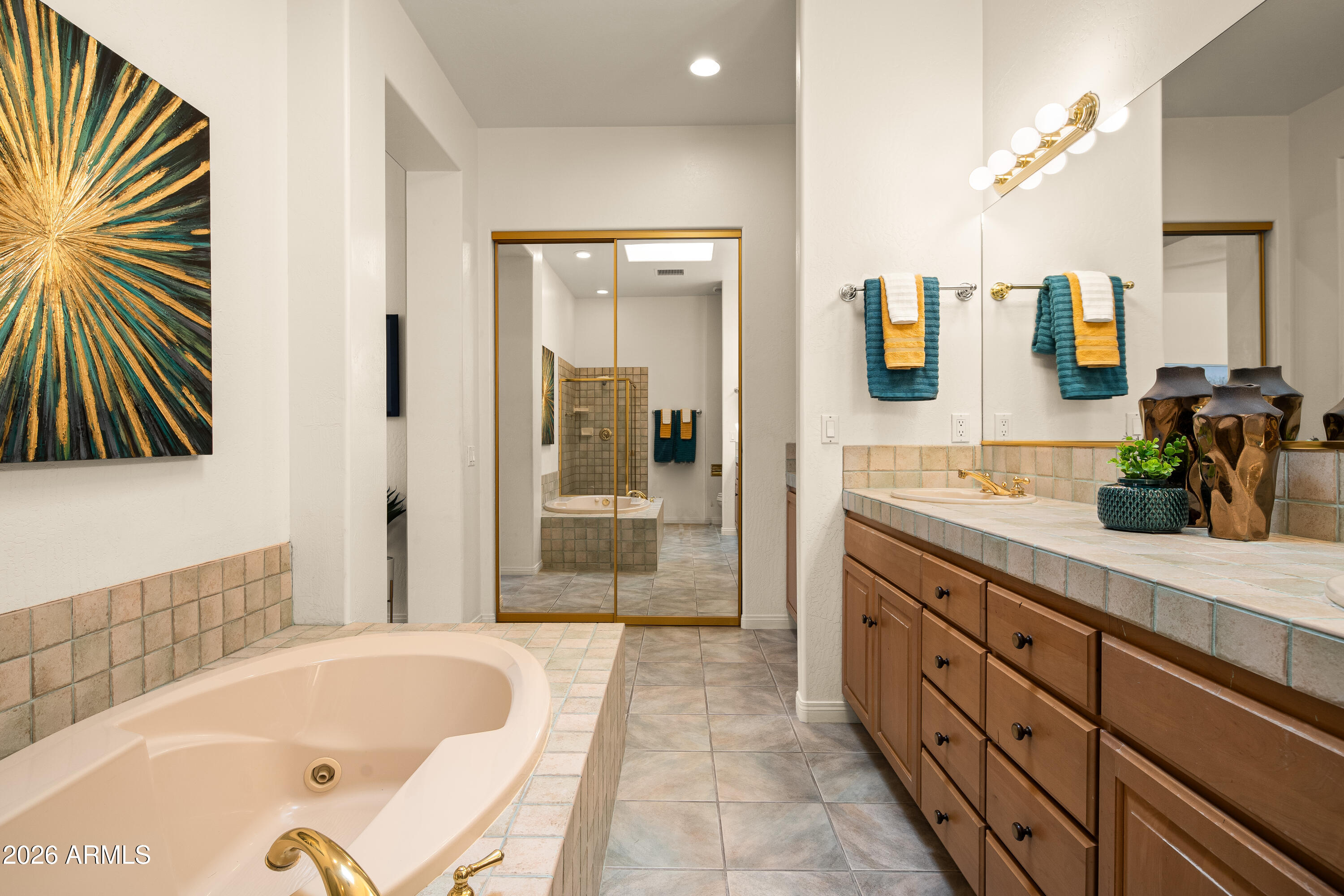39 Rim Trail Circle Sedona, AZ 86351 - Photo 24 of 41 a bathroom with a tub sink and mirror