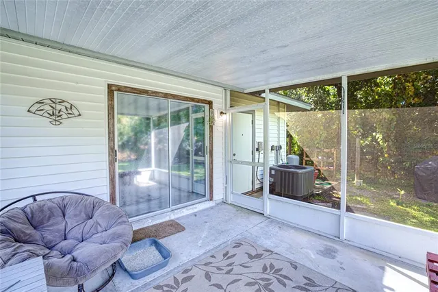 a view of livingroom with furniture and window