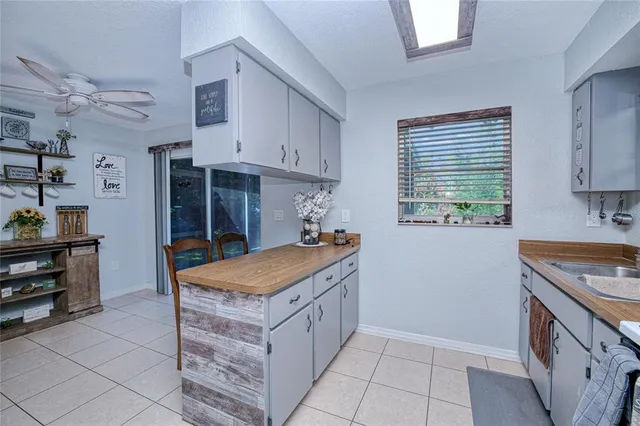 a kitchen with a stove and a sink