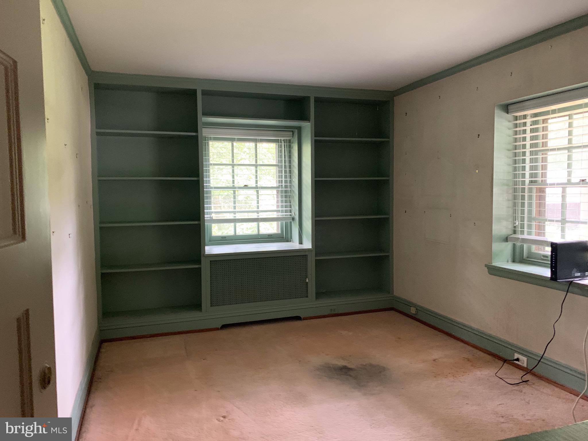 315 Kent Road Wynnewood, PA 19096 - Photo 14 of 19 a room with a window and a chair