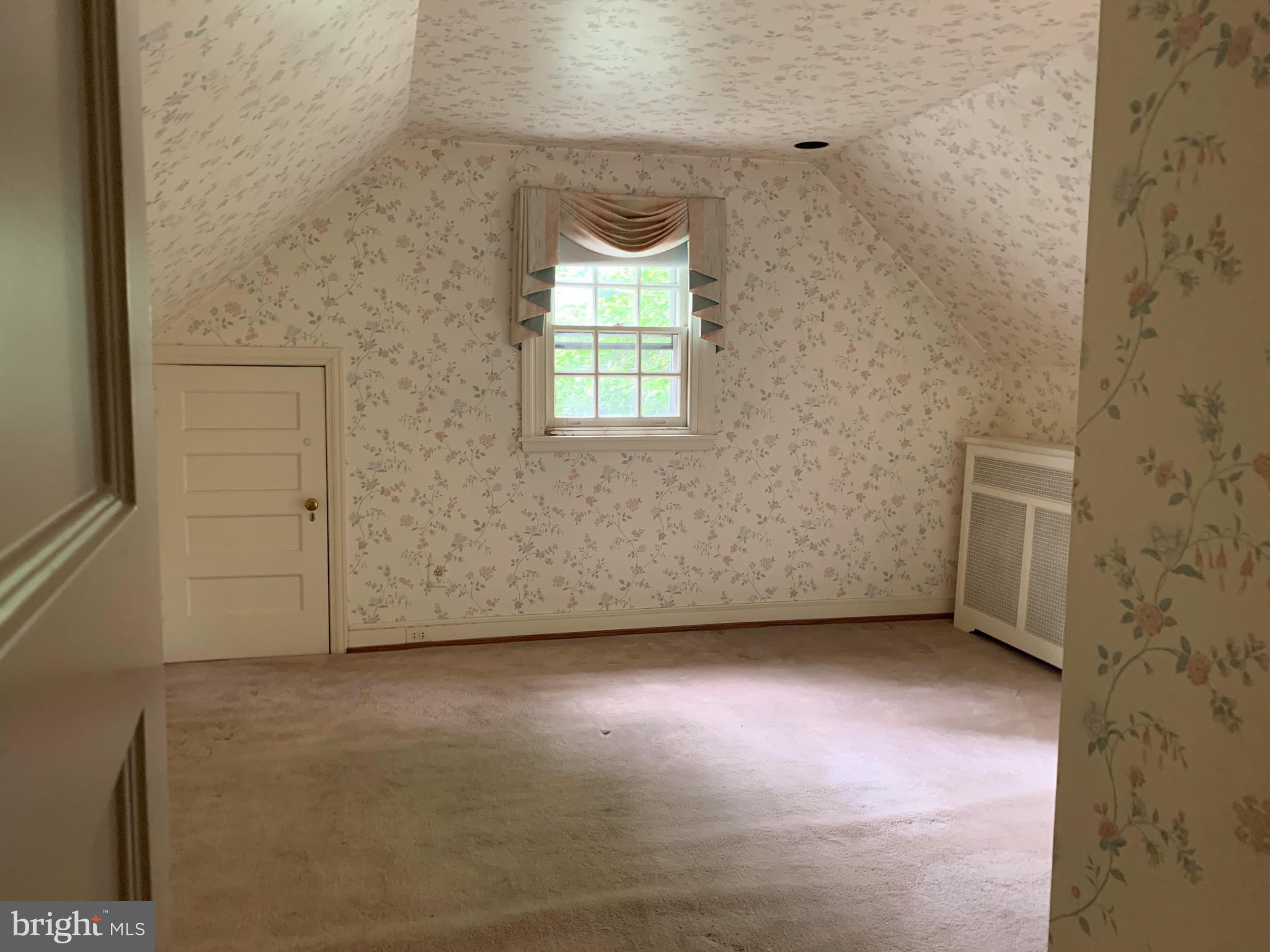 315 Kent Road Wynnewood, PA 19096 - Photo 18 of 19 a view of an empty room with a window