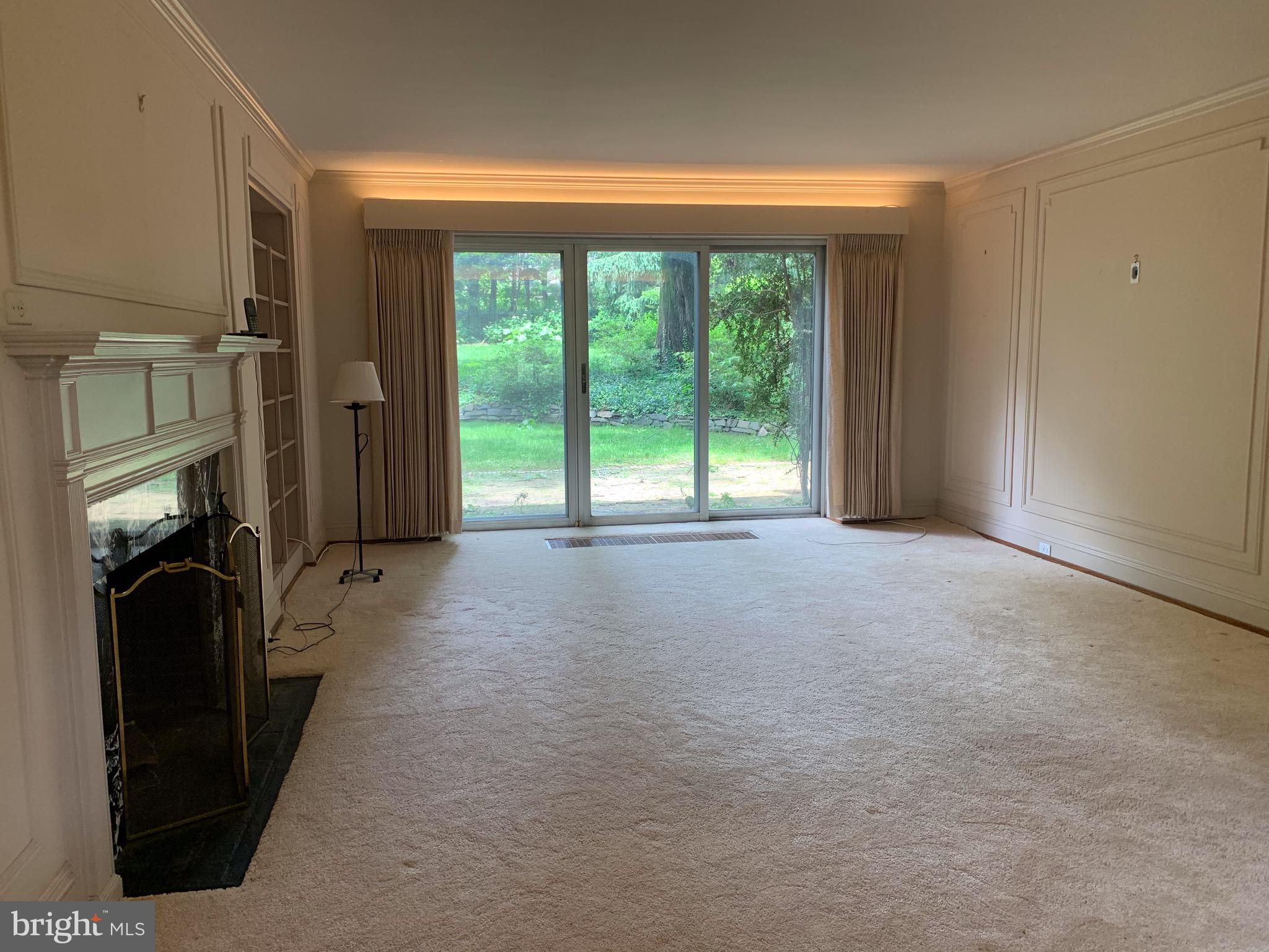 315 Kent Road Wynnewood, PA 19096 - Photo 4 of 19 a view of empty room with large windows