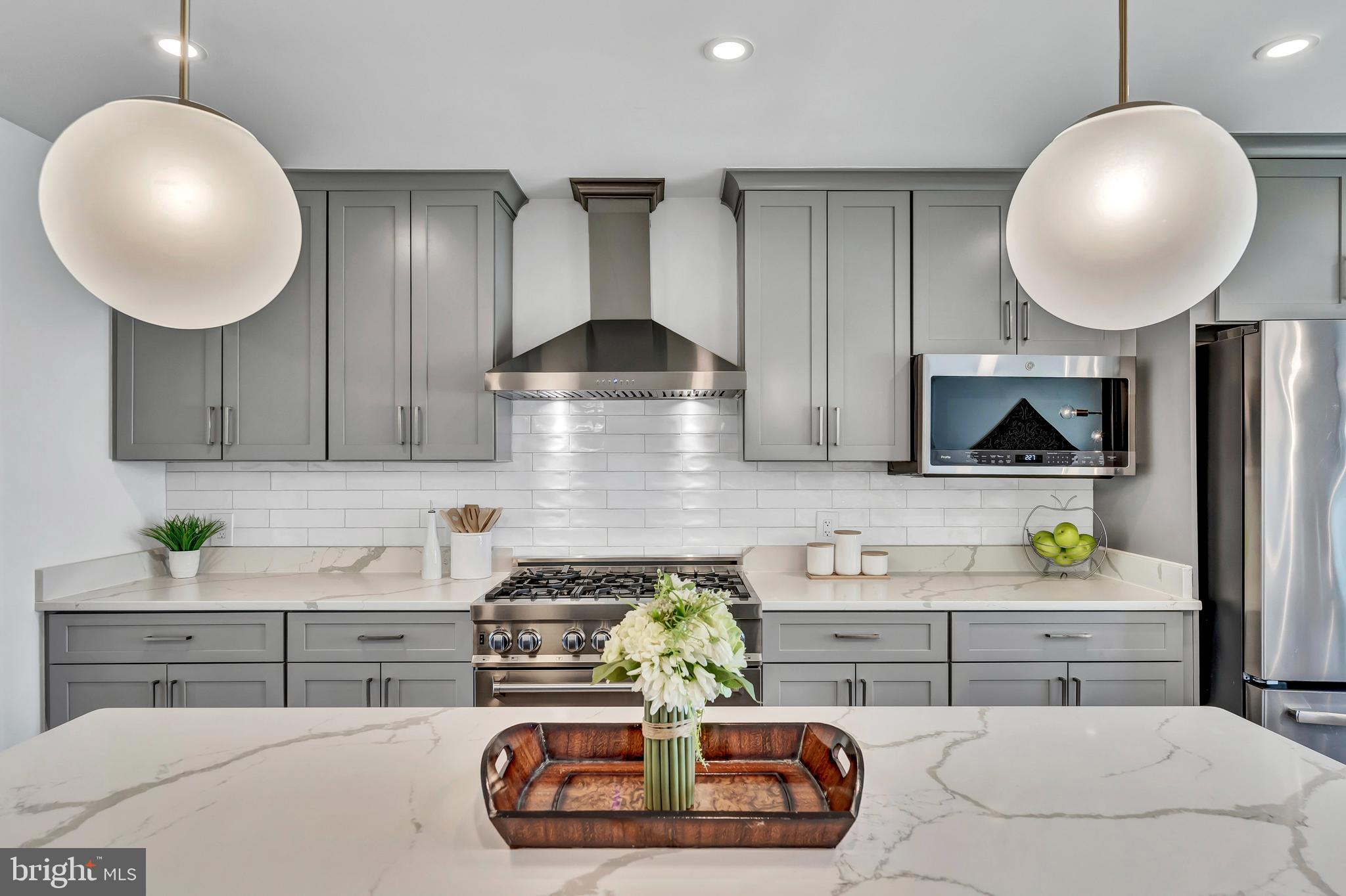 2416 Rocky Branch Road Vienna, VA 22181 - Photo 30 of 69 Gather round the extra large kitchen island