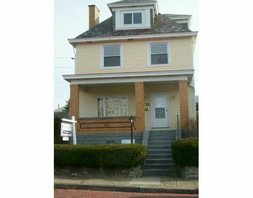 301 Rothman Street Arlington, PA 15210 - Photo 1 of 8 Exterior Front.