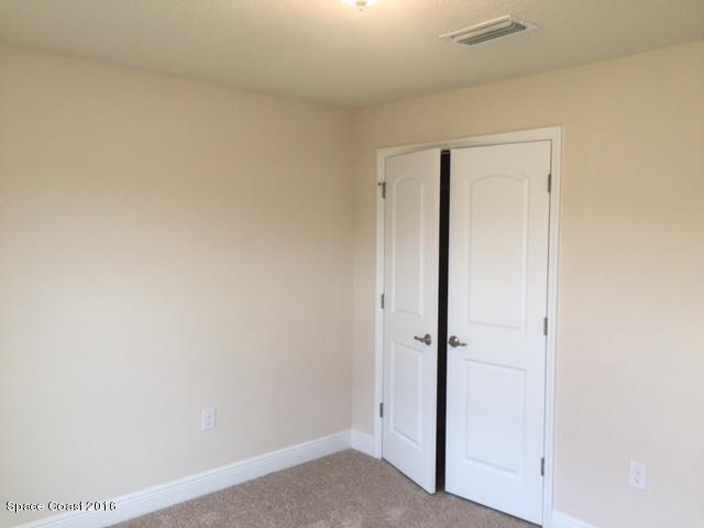 201 Nardo Avenue Southwest Palm Bay, FL 32908 - Photo 14 of 16 Guest Bedroom
