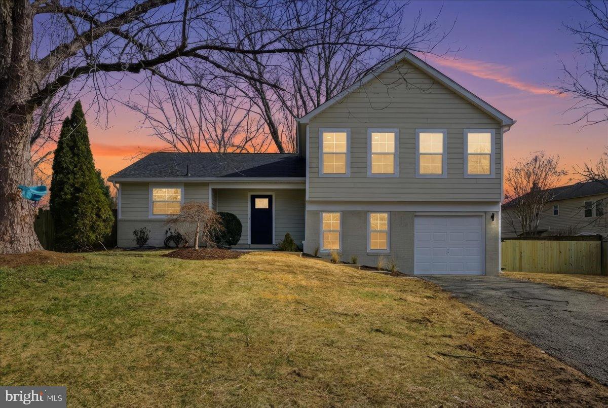 Charming home at dusk with vibrant skies.