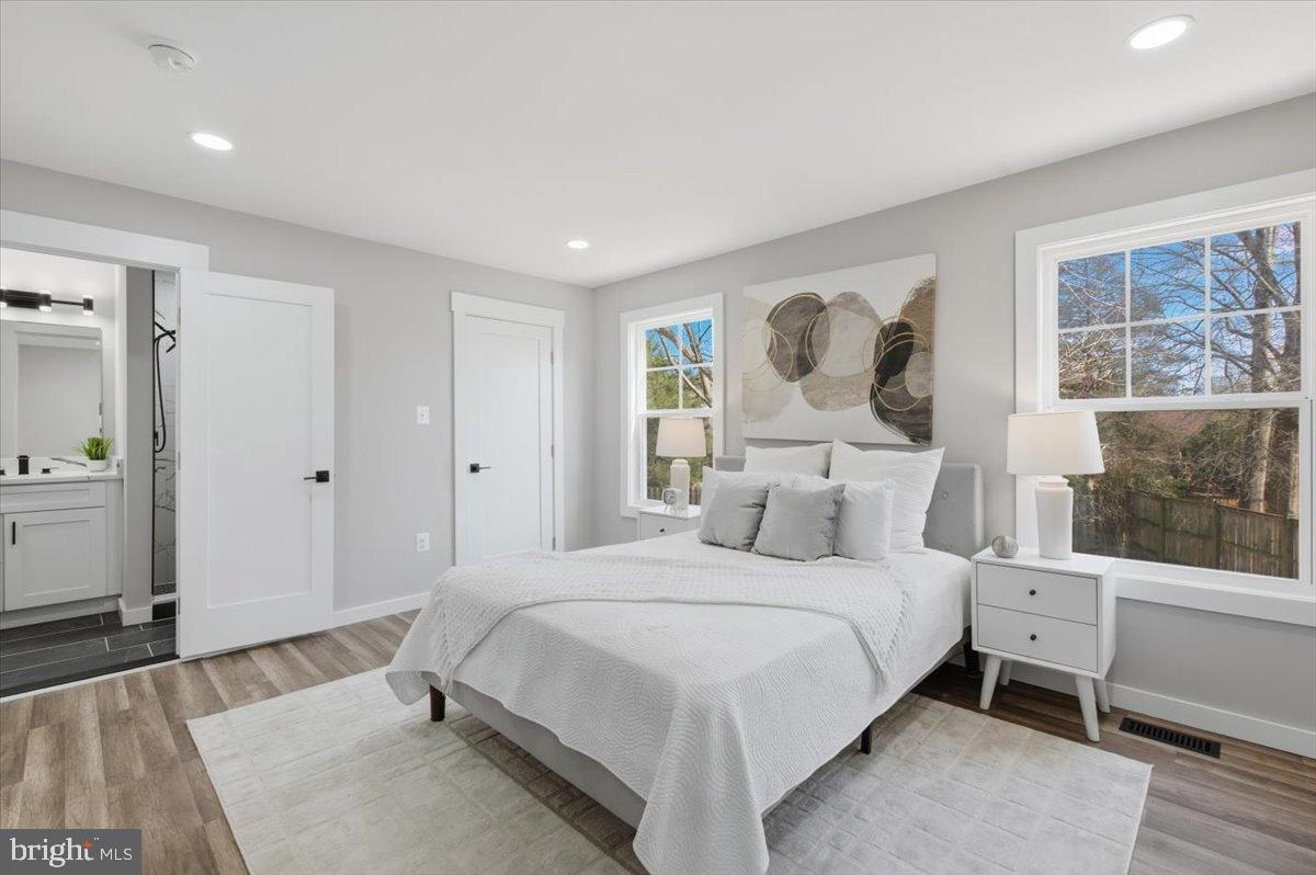 4529 Flintstone Road Alexandria, VA 22306 - Photo 13 of 37 Bright and airy bedroom with modern charm.