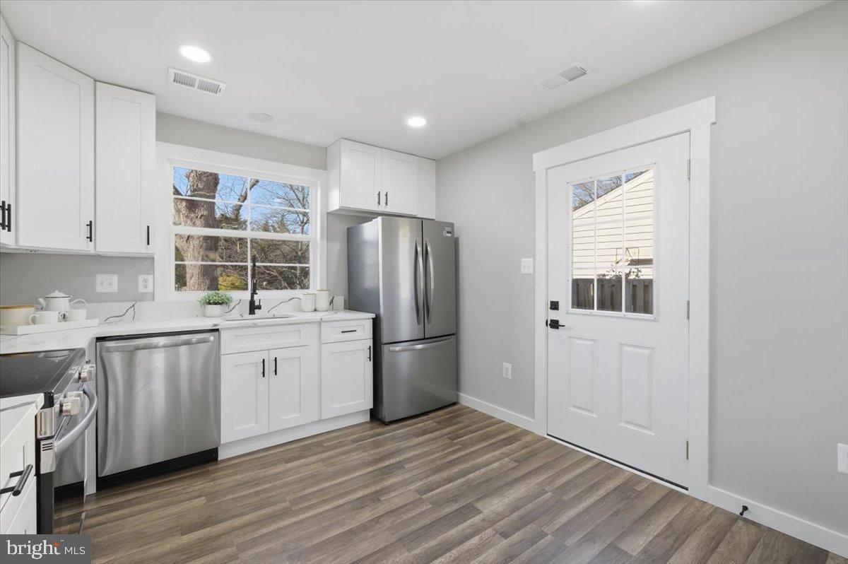 4529 Flintstone Road Alexandria, VA 22306 - Photo 24 of 37 Bright and modern kitchen with natural light.