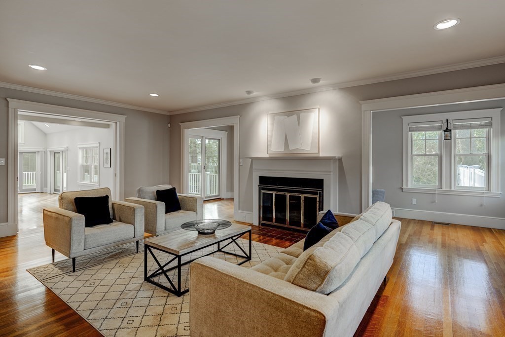 200 Chapman Street Canton, MA 02021 - Photo 15 of 42 a living room with furniture and a fireplace