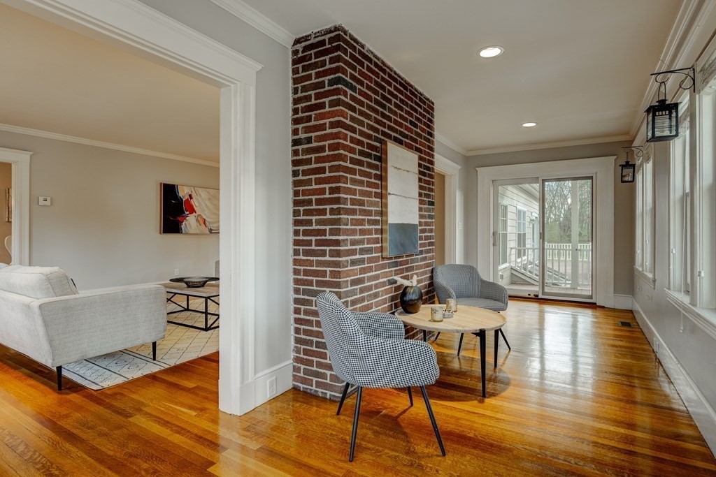 200 Chapman Street Canton, MA 02021 - Photo 17 of 42 a living room with furniture and wooden floor