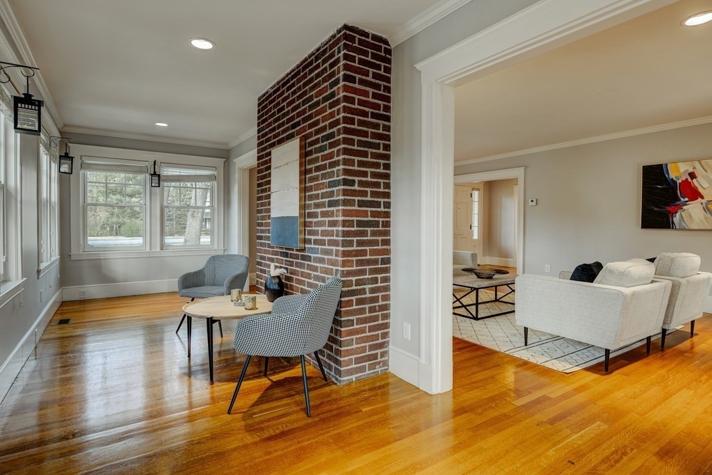 200 Chapman Street Canton, MA 02021 - Photo 18 of 42 a living room with furniture and a wooden floor