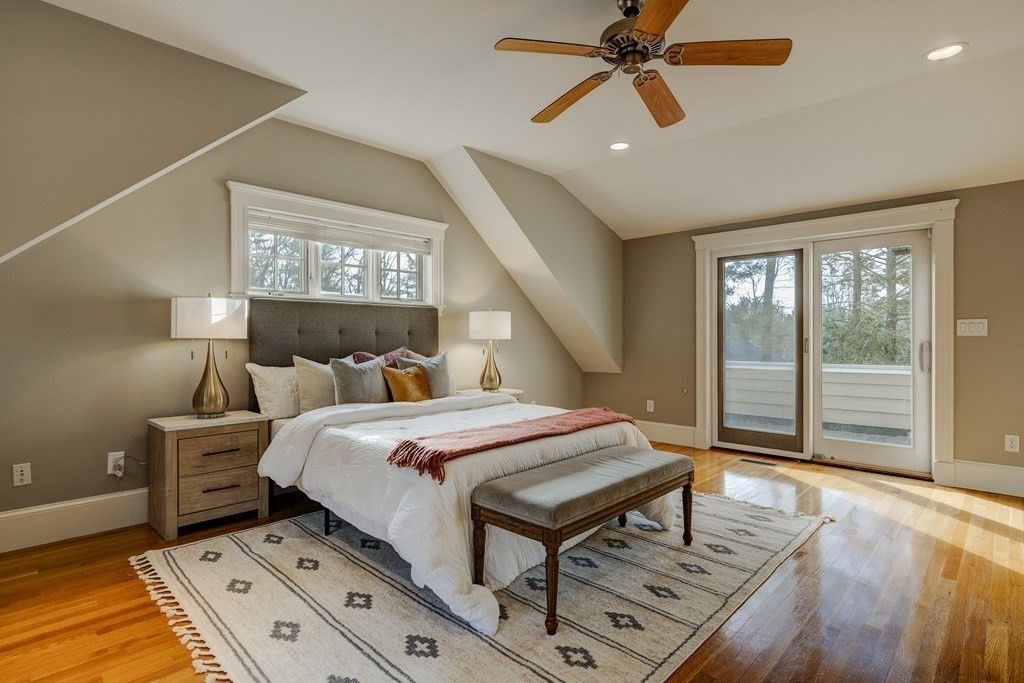 200 Chapman Street Canton, MA 02021 - Photo 21 of 42 a bed room with a bed and a chandelier