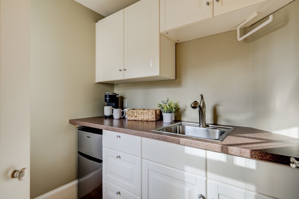 200 Chapman Street Canton, MA 02021 - Photo 22 of 42 a kitchen with sink and cabinets