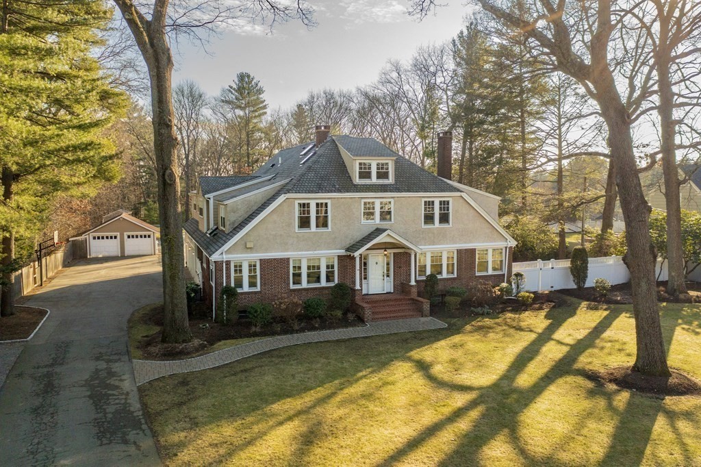 200 Chapman Street Canton, MA 02021 - Photo 4 of 42 a front view of a house with swimming pool