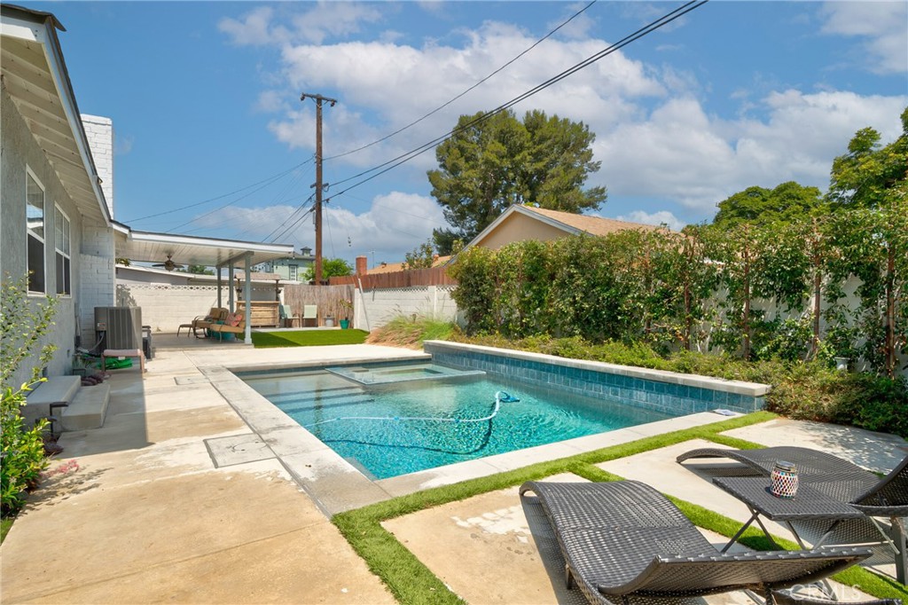 1805 West Random Drive Anaheim, CA 92804 - Photo 11 of 46 a view of swimming pool with seating area