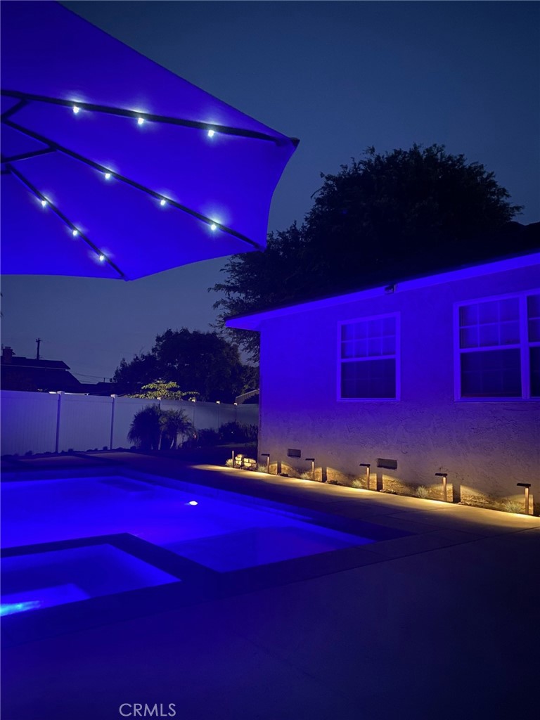 1805 West Random Drive Anaheim, CA 92804 - Photo 19 of 46 a view of a red building with swimming pool and sitting space
