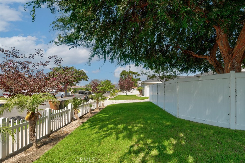 1805 West Random Drive Anaheim, CA 92804 - Photo 3 of 46 a view of a yard with wooden fence