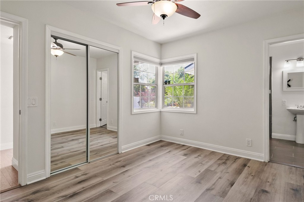 1805 West Random Drive Anaheim, CA 92804 - Photo 36 of 46 wooden floor in an empty room with a window