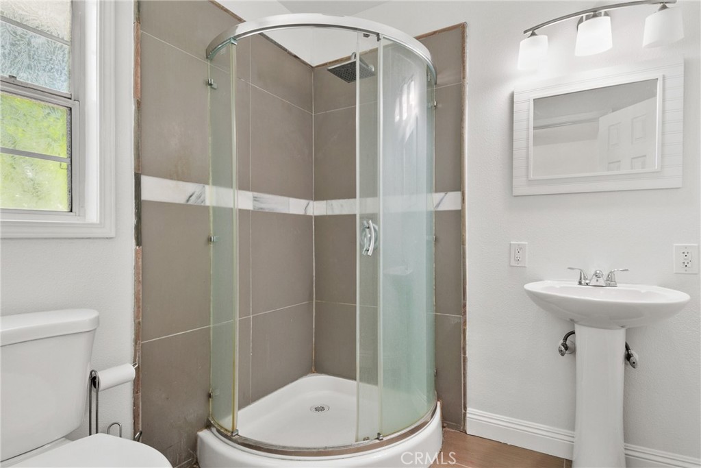 1805 West Random Drive Anaheim, CA 92804 - Photo 37 of 46 a bathroom with a toilet sink and shower