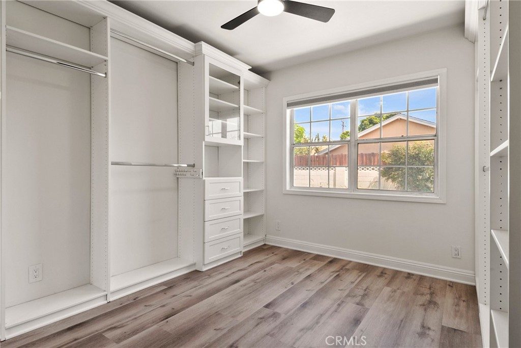 1805 West Random Drive Anaheim, CA 92804 - Photo 38 of 46 a view of empty room with wooden floor and fan