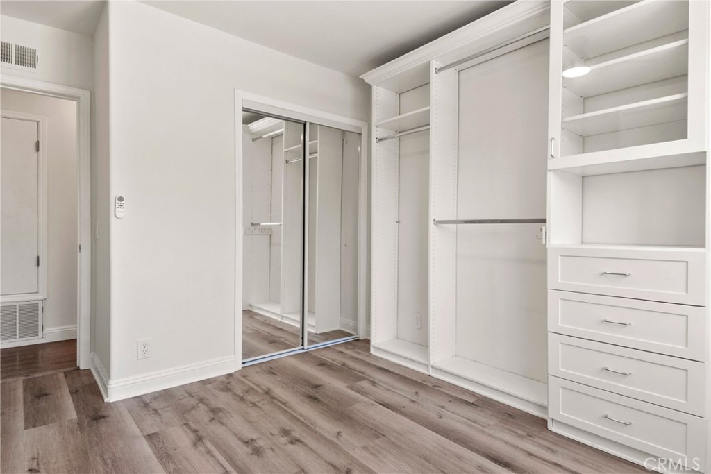 1805 West Random Drive Anaheim, CA 92804 - Photo 40 of 46 a view of walk in closet with empty racks