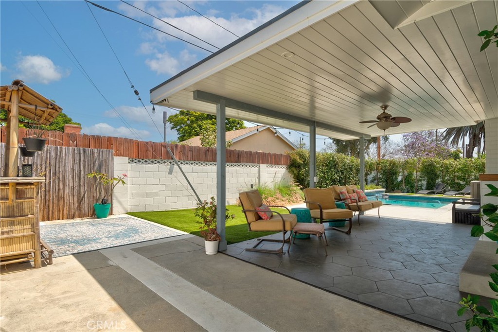 1805 West Random Drive Anaheim, CA 92804 - Photo 5 of 46 a view of a patio with table and chairs and potted plants