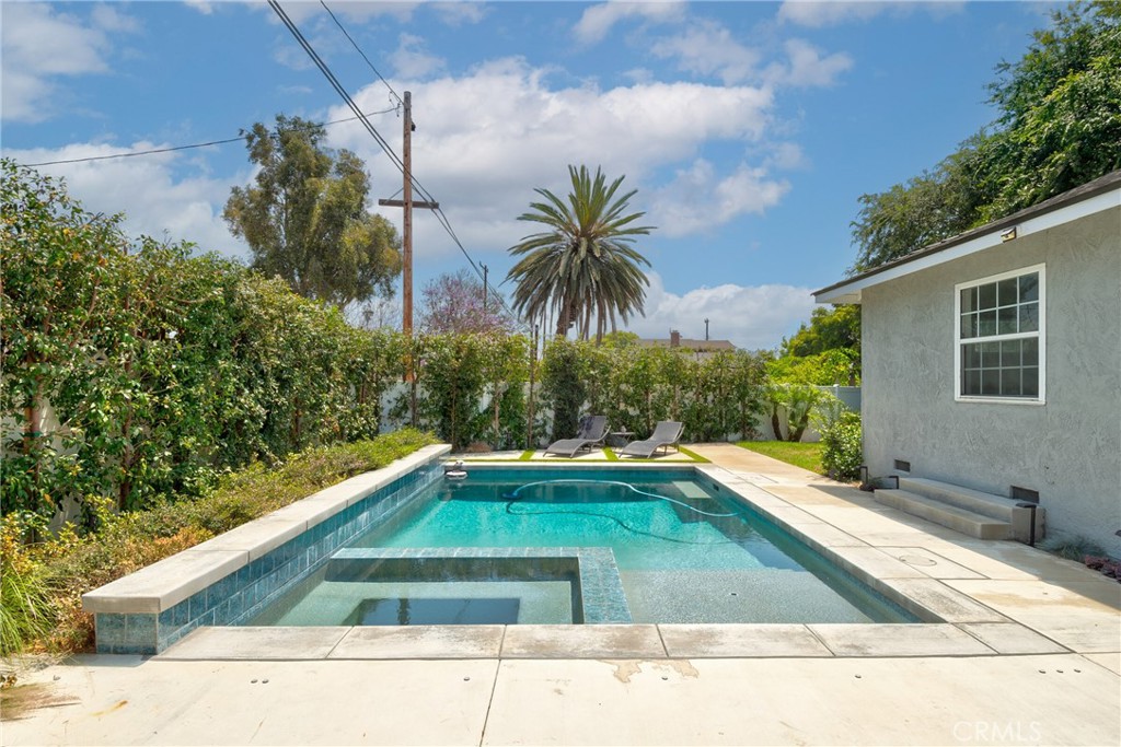 1805 West Random Drive Anaheim, CA 92804 - Photo 9 of 46 a view of swimming pool on a sunny day with lawn chairs