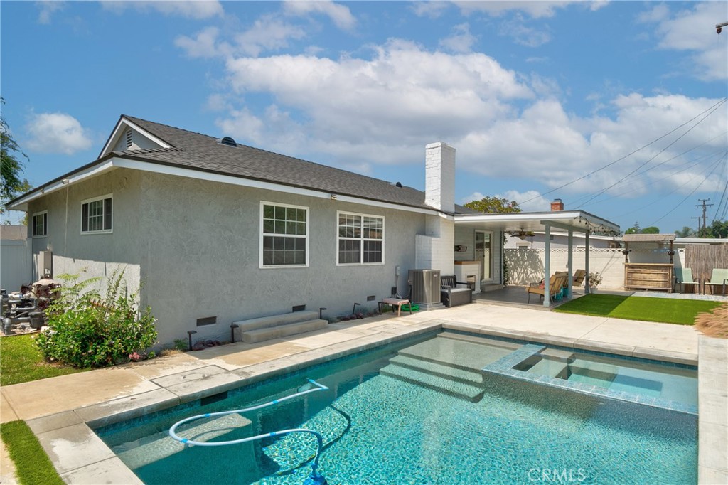 1805 West Random Drive Anaheim, CA 92804 - Photo 10 of 46 a house view with pool and chairs