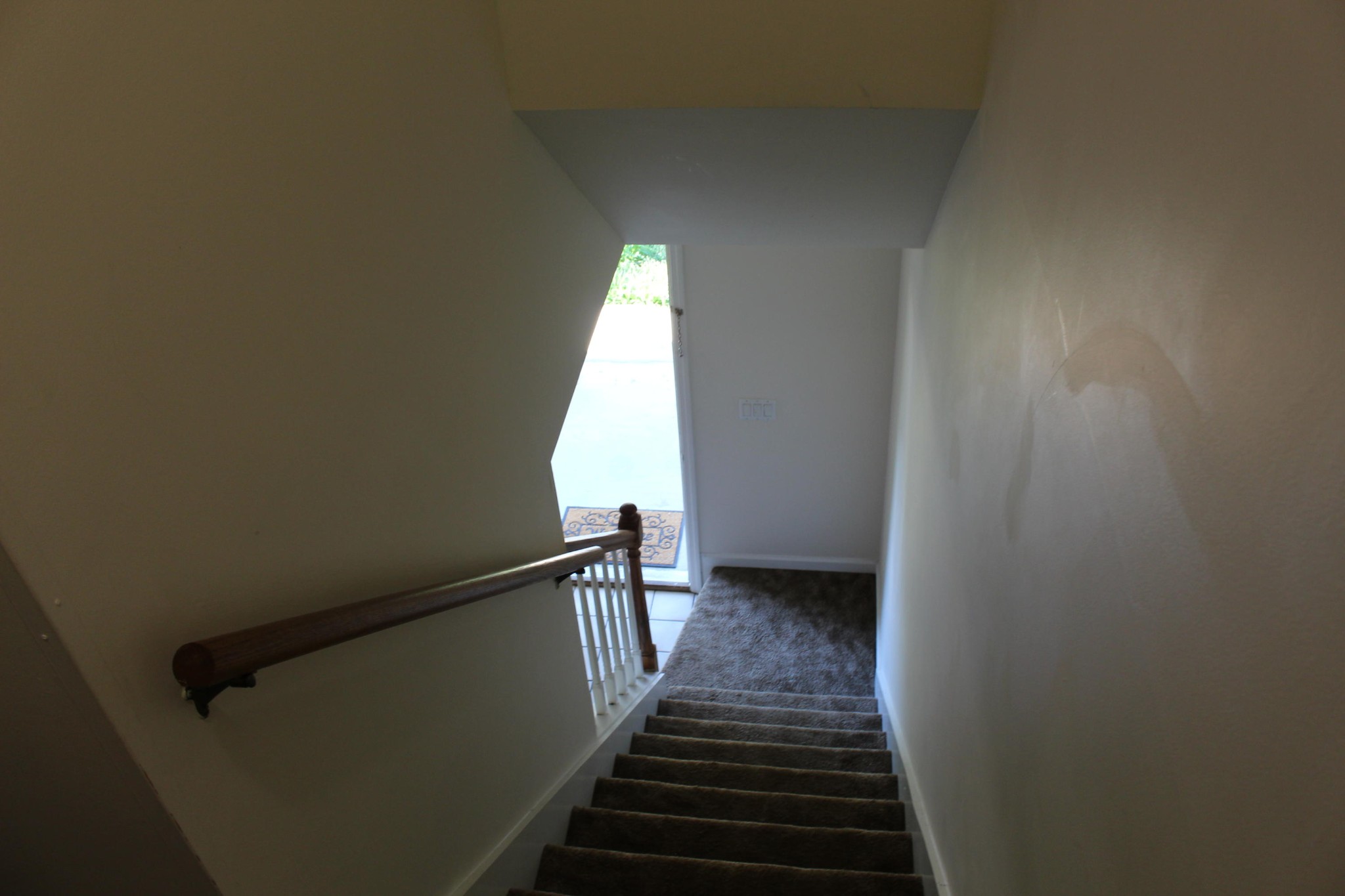 2133 Jenkins Road Chattanooga, TN 37421 - Photo 8 of 10 a view of a hallway with wooden floor and stairs