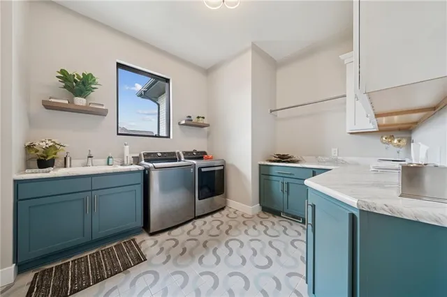 a kitchen with a sink stove and refrigerator