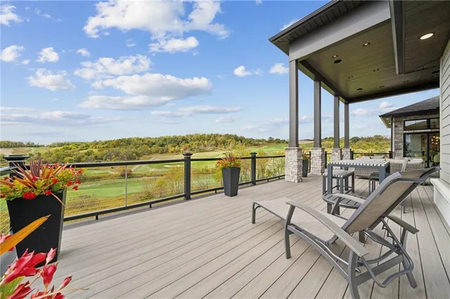 a view of swimming pool with seating space