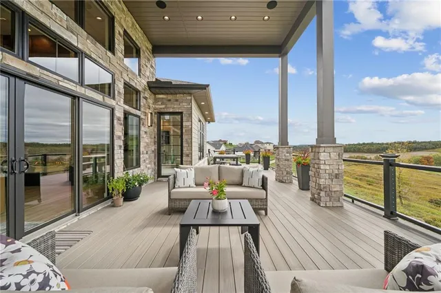 a view of roof deck with patio