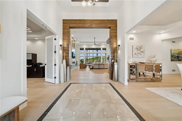 a view of a hallway with living room