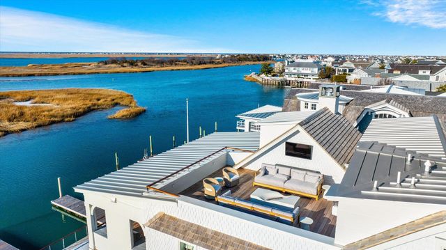 a view of a terrace with chairs
