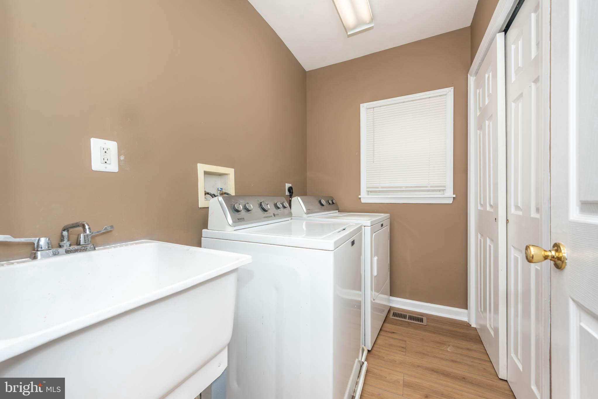4021 Barrington Road Baltimore, MD 21207 - Photo 15 of 50 a bathroom with a sink and a mirror