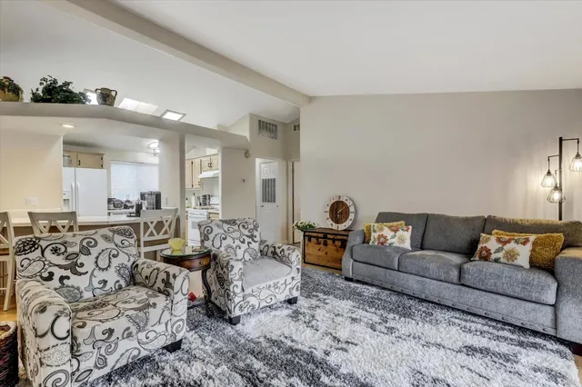 a living room with furniture and a couch