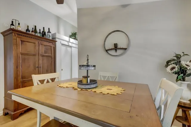 a view of a dining room with furniture