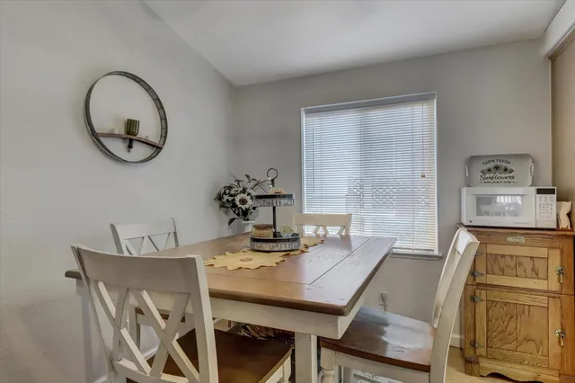 a view of a dining room with furniture