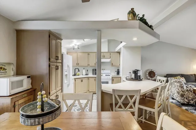 a view of a dining room with furniture